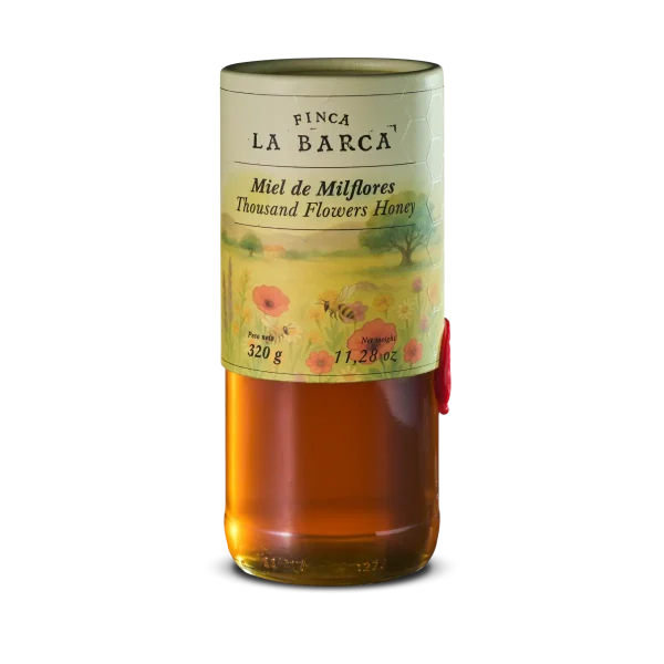 milflores honey Finca La Barca Wildflower Honey in a glass jar – a natural, golden honey made from the nectar of wildflowers.